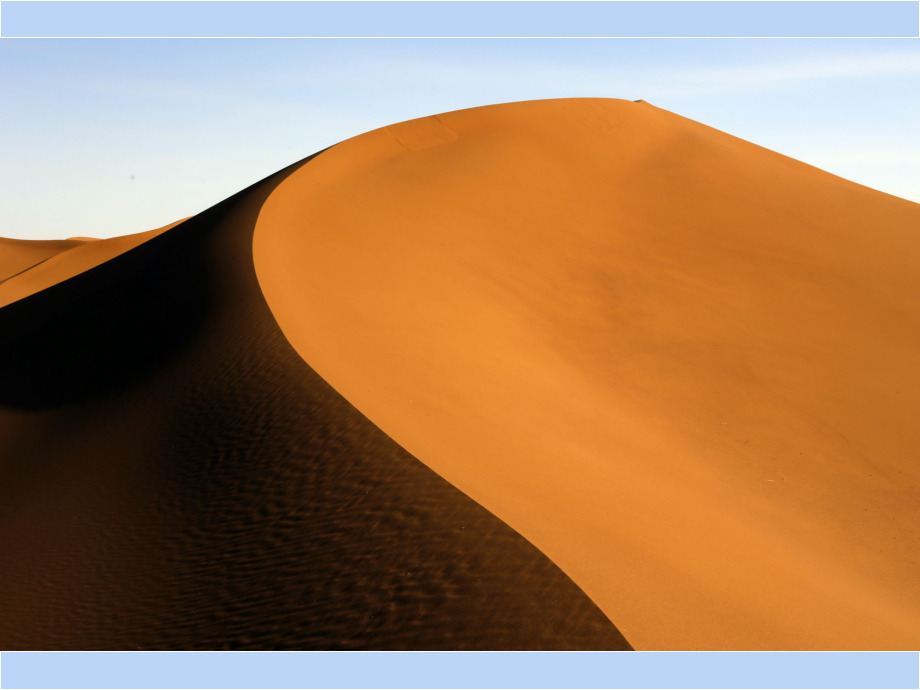 Baumeister Wind: windgeformter Dünenkamm in der Sahara